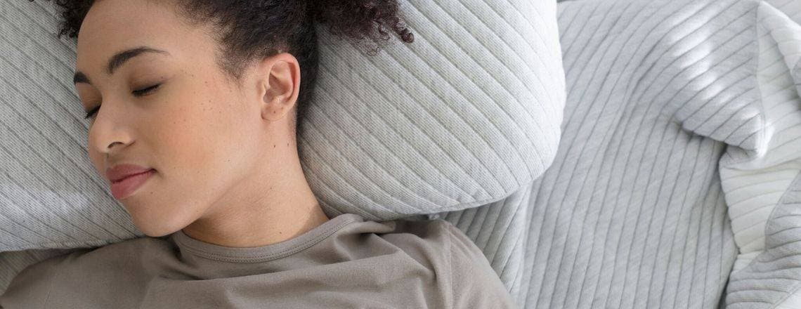 Lady sleeping on a Leesa mattress